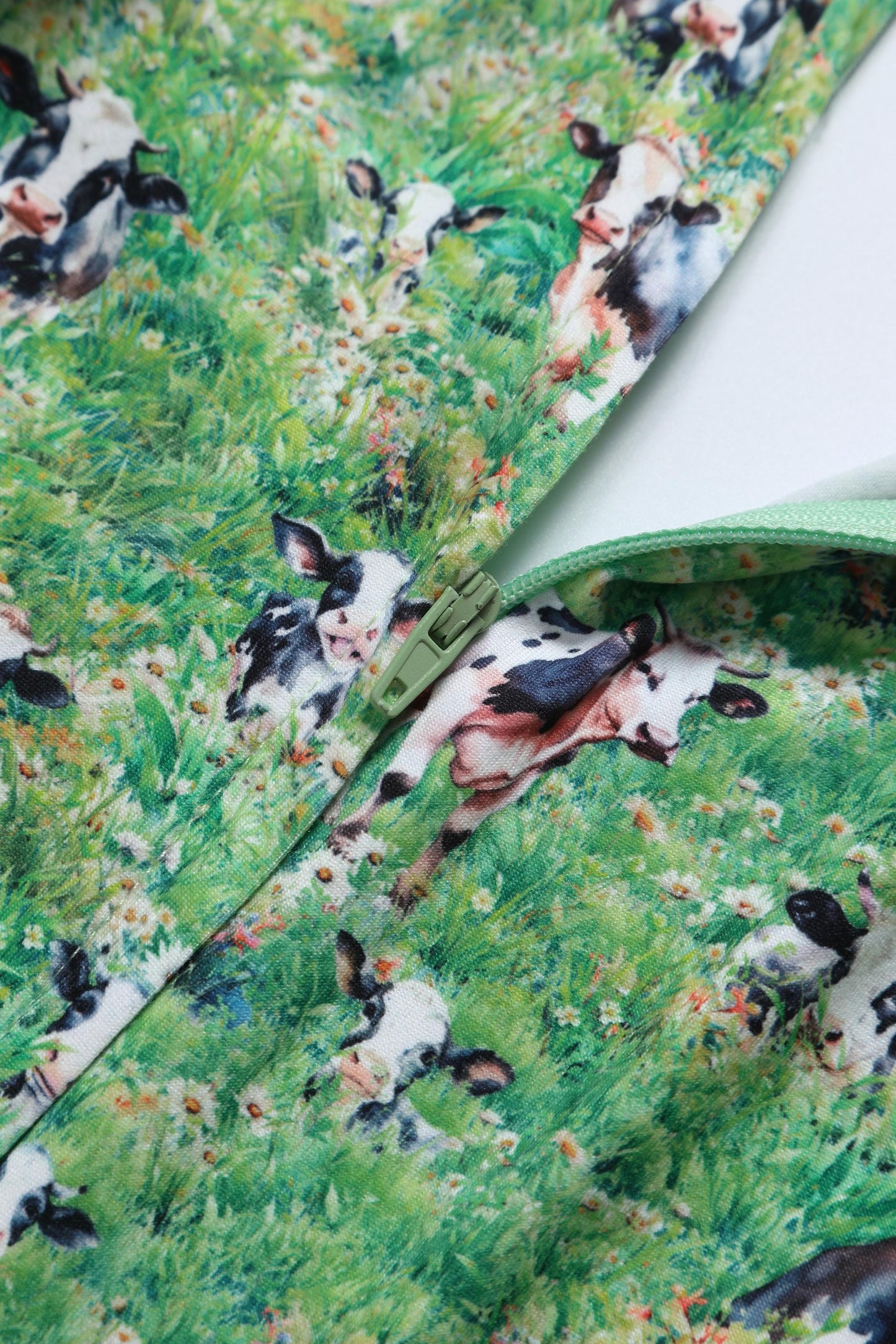 Palma Short Sleeved Tea Dress in Green Cow Field Print